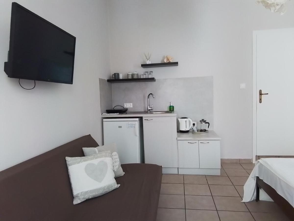 Morpheus Rooms Kini Extérieur photo