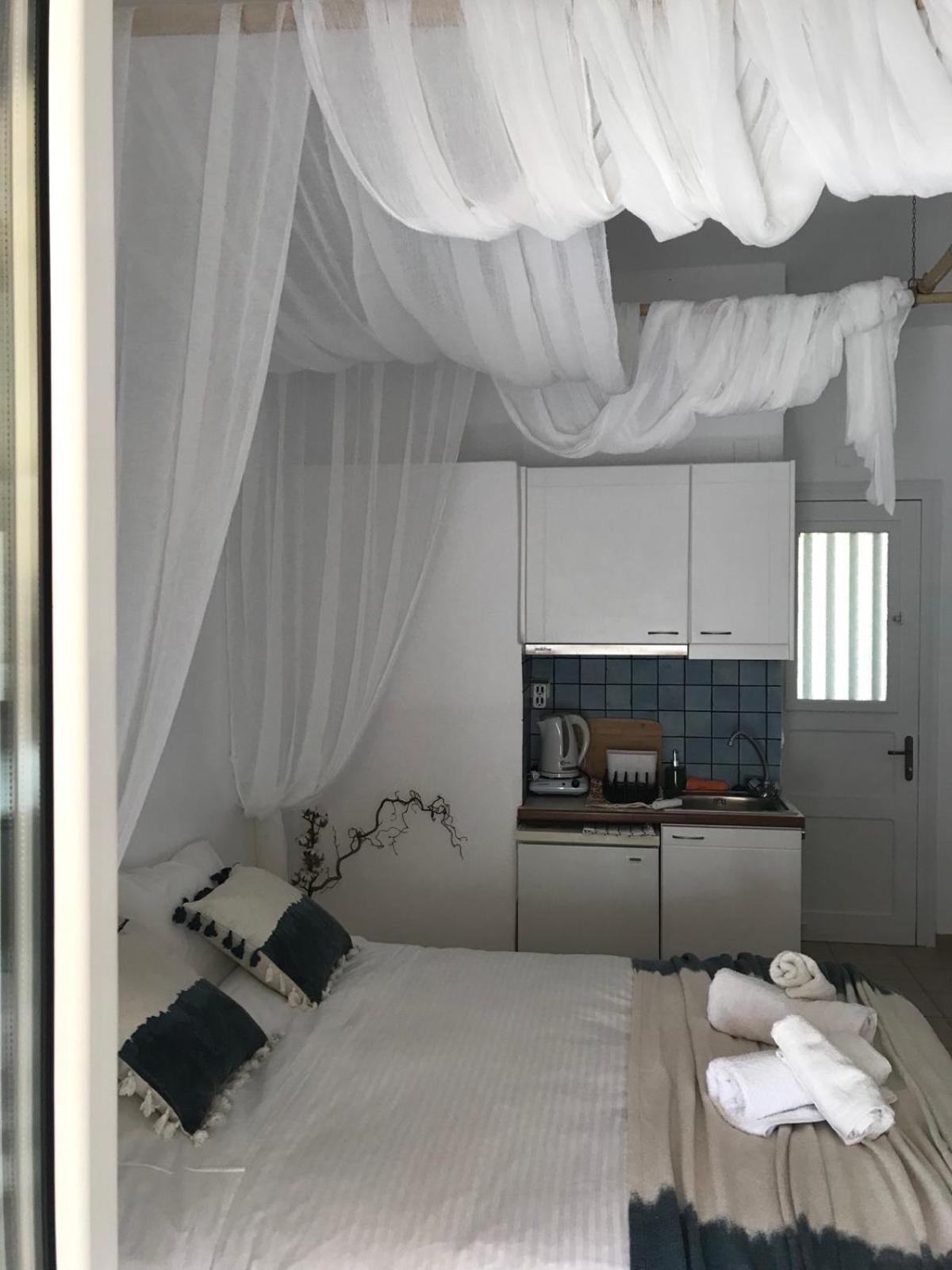 Morpheus Rooms Kini Extérieur photo